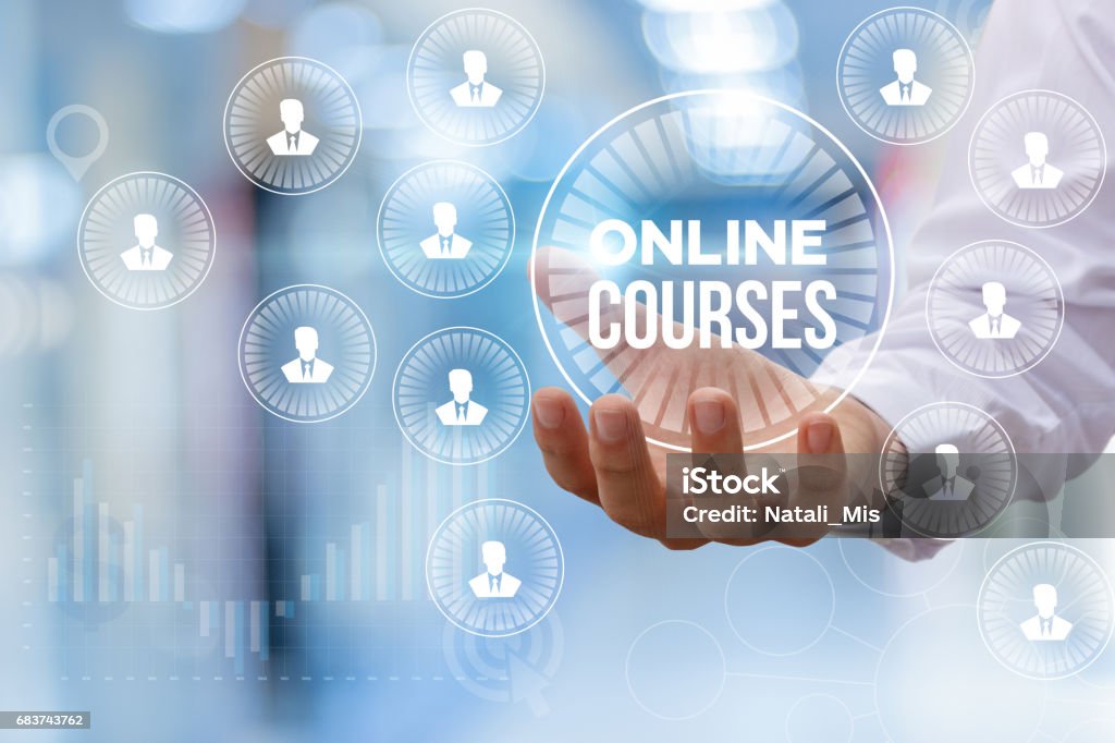 Online course in hand. Online course in hand businessman on blurred background. Education Training Class Stock Photo