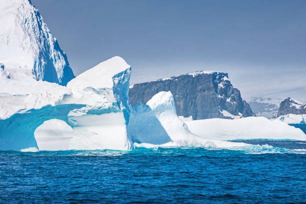 istock Coastline with iceberg bridge in Antarctica 683747254