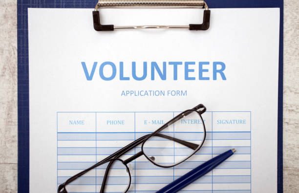 istock Blank Volunteer sign up sheet with clipboard and pen 683757878