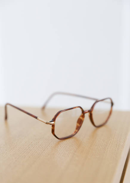 istock An eyeglasses on the wooden table 683759762