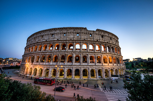 Front view of Coliseum in Rome at sunset with blank space. Italy