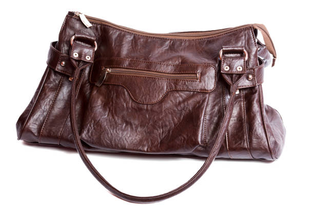 istock Brown leather trendy purse for women isolated 683780432
