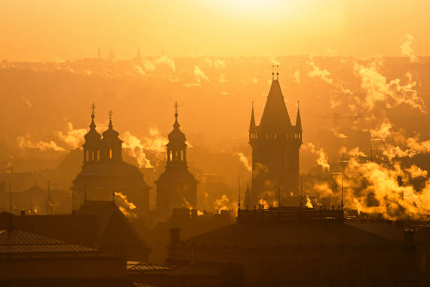 Car driving in a city street at Sunset. Flares.Prague, Czech Republic.More images from Prague: