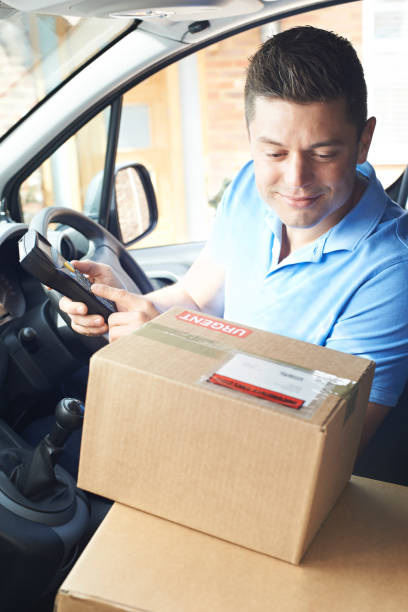 istock Courier In Van Delivering Package To Domestic House 683792836