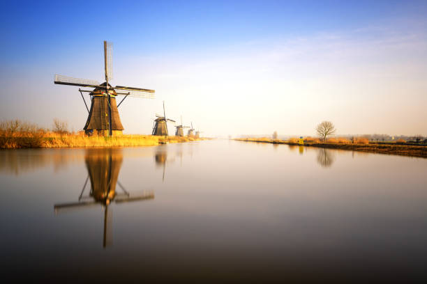 istock Sunset view at typical windmill at Kinderdijk, Holland. 683793674