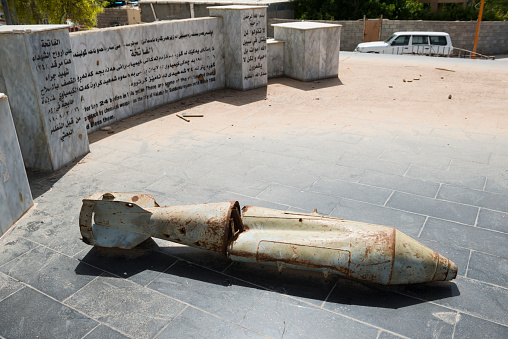 The remains of a bomb at a cemetery in Halabja, Iraq. The cemetery holds the remains of the people killed on March 16, 1988, in a chemical attack by Sadaam Hussein's forces. The attack occured in the final months of the eight-year-long Iran-Iraq War, and took the lives of up to 5,000 people in Halabja.