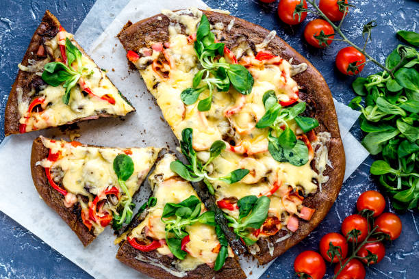 istock restaurant kitchen with pizza preparing on stone background top view 683802386