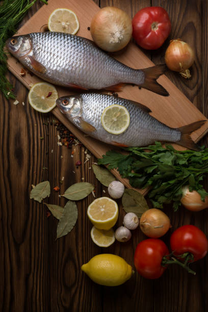 istock Fresh fish on a wooden table 683807856