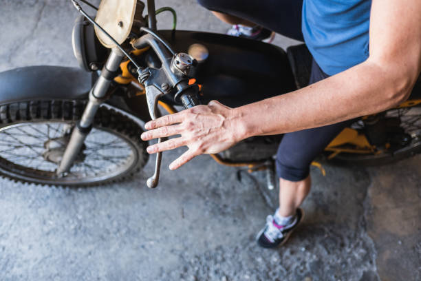 istock Woman Mechanic Check Motorcycle 683808056