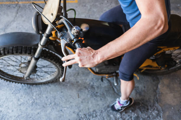 istock Woman Mechanic Check Motorcycle 683808058