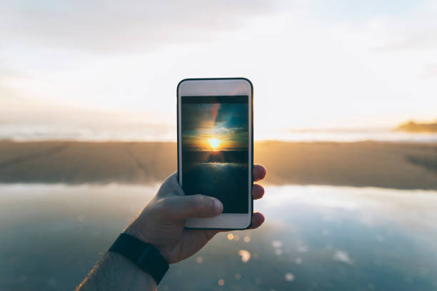 istock Taking a photo of the sunset 683816208