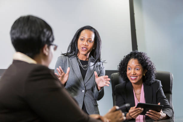 istock Minority women managing business 683829652