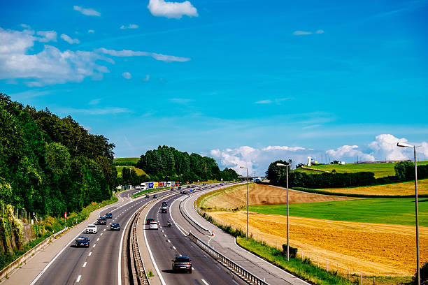 istock Vehicles On Road Along Landscape 683830857