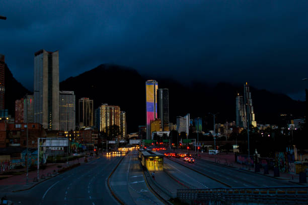 paisaje urbano de bogotá por la noche - photography tower cityscape flag fotografías e imágenes de stock