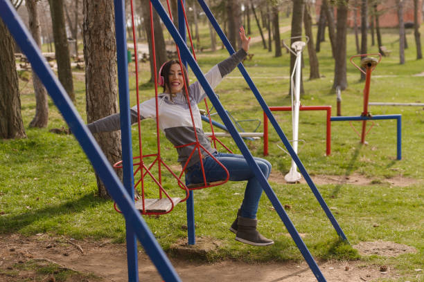 istock Young woman on a swing 683845192