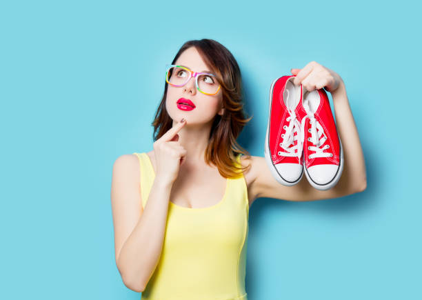 istock young woman with gumshoes 683847550