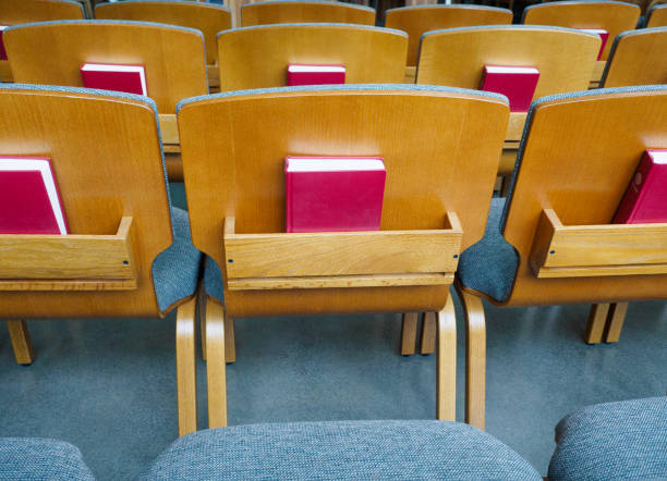 istock Seat rows with bibles in the church 683860084