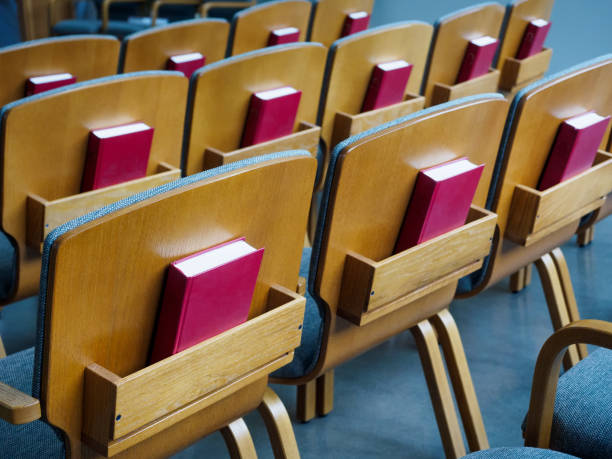 istock Seat rows with bibles in the church 683860188