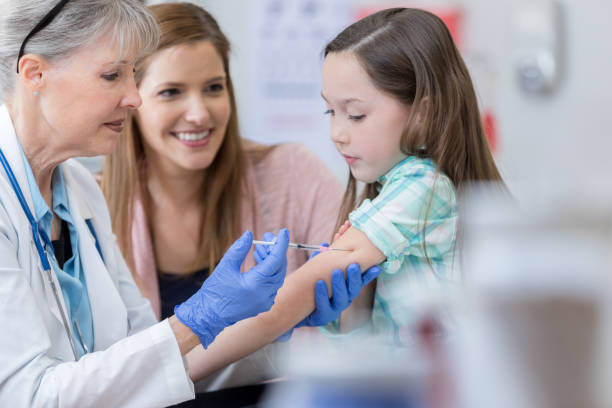 istock Pediatrician gives child an injection 683866478