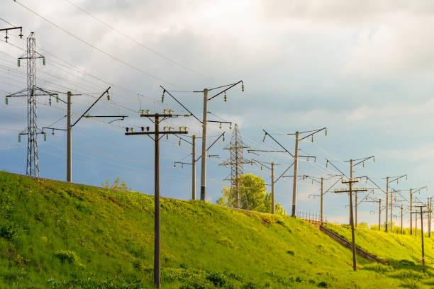 istock The electrified railway goes into the distance against a blue sky 683866540