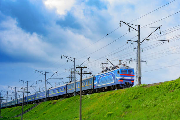 istock The train travels to a meeting from the zone with gray clouds 683867426