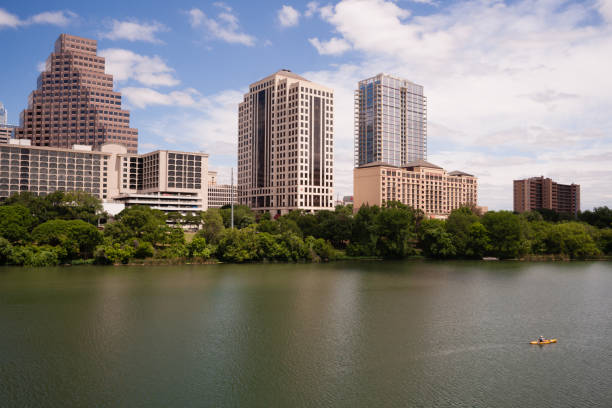 istock Man Kayaking Colorado River Austin Texas Downtown City Skyline 683882284