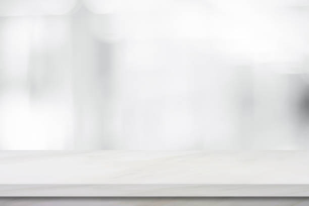 Empty white marble over blur store background, product and food display montage