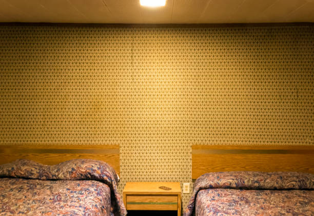 Lonely motel room An empty and dated motel room in Kentucky. motel stock pictures, royalty-free photos & images