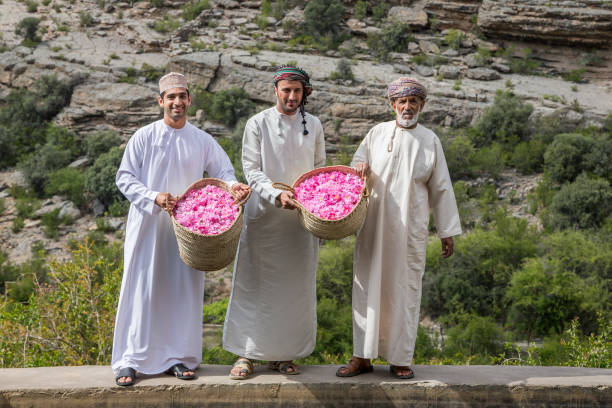 omani men with rose petals at jabal al akhdar - harbor imagens e fotografias de stock