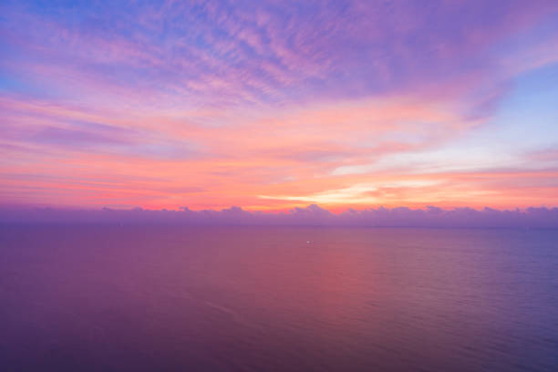 istock Bright sunrise or sunset  over the beach an impressive 683894328