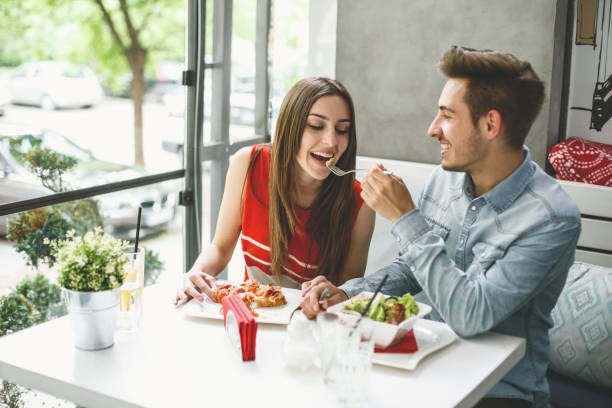 istock Boyfriends sharing food with his girlfriend 683900638