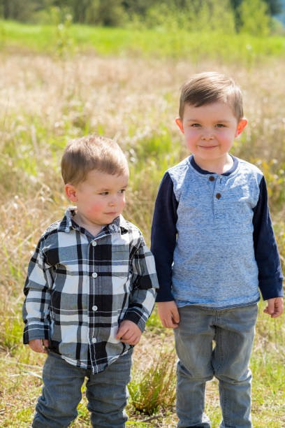 istock Brothers Playing Outdoors 683902028