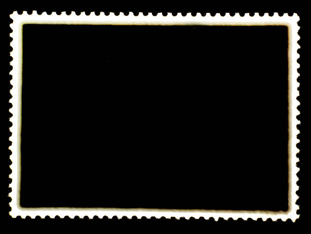 черный размещен штамп обратной стороне с белым краем листа. изолирован на черном фоне. - frame at the edge of dirty paper stock illustrations
