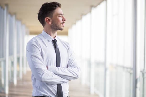 istock Ambitious and confident businessman in corridor 683910860