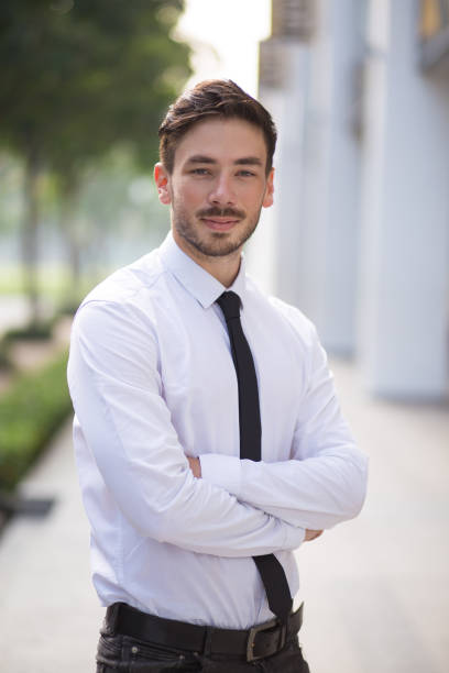 istock Ambitious businessman standing in street 683910864