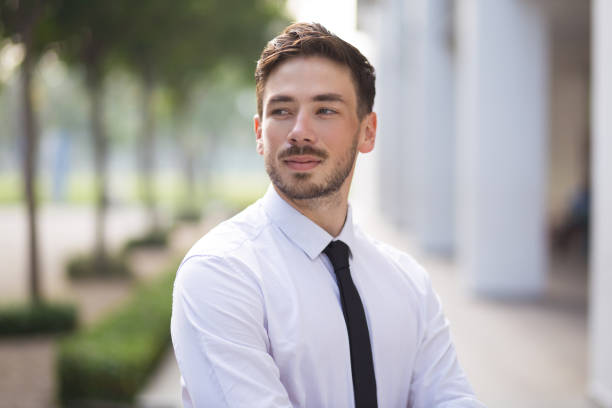istock Purposeful young businessman looking away 683910990