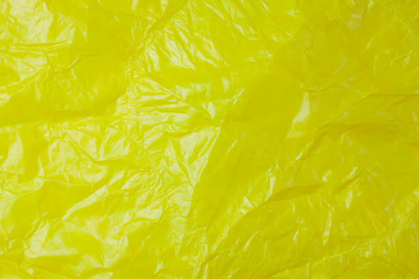 istock Crumpled recycle yellow paper background. 683912404