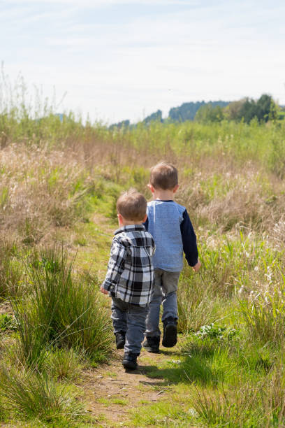 istock Brothers Playing Outdoors 683914614