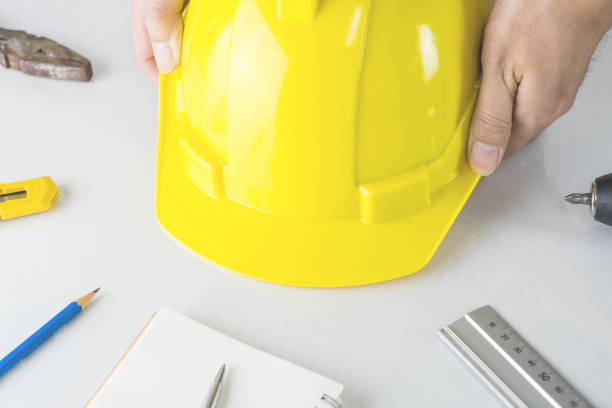 istock Construction worker is pick up helmet as the most important tools 683915138