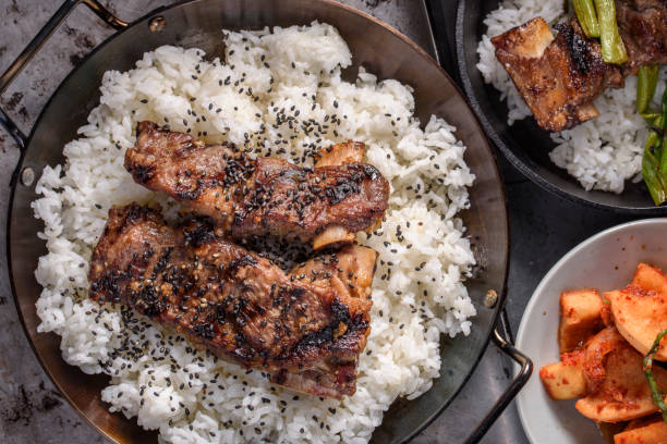 istock Grilled Kalbi, marinated short rib, over Steamed Rice 683915368
