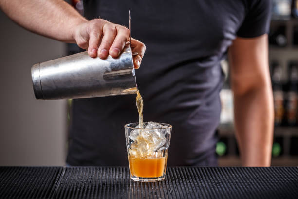istock Barman pouring a cocktail 683921222