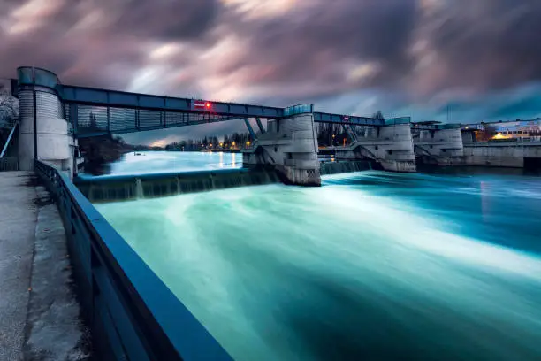 Water rushing out of dam. Seine river, Chatou, France