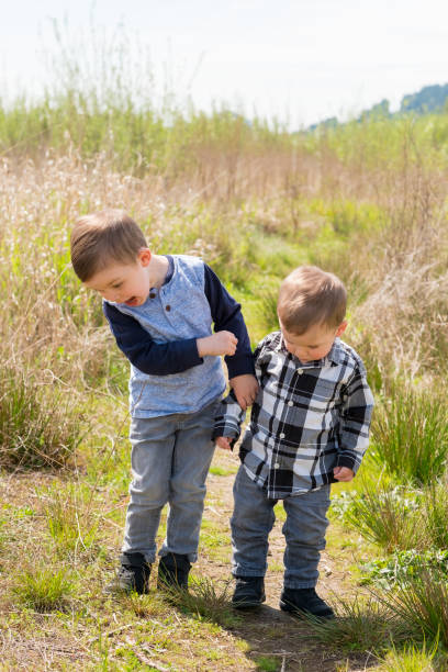 istock Brothers Playing Outdoors 683923816