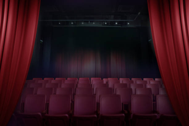 istock open curtain theater before showtime , empty auditorium with seats 683926566