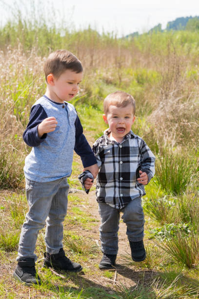 istock Brothers Playing Outdoors 683930470