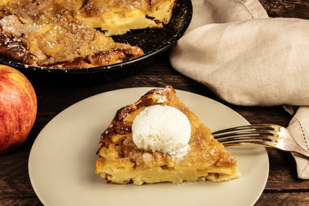 istock Slice of apple pie with icecream cone on blurred background 683936906