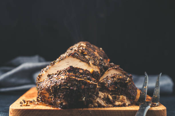 istock Grilled Turkey tenderloin on a wooden cutting Board 683937014