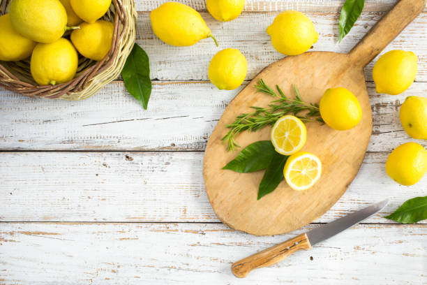 istock Pile of lemons on wooden table 683939896