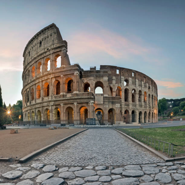 sunrise at colosseum, rome, italy - rome ancient rome skyline ancient imagens e fotografias de stock