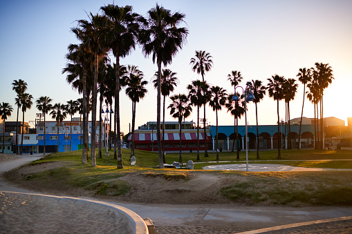 Empty sand pools and walkways at Venice Beach, California early in the morning.